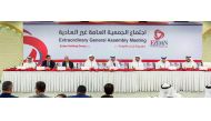 Sheikh Dr Khalid bin Thani Al Thani (second right), Chairman of the Board of Directors of Ezdan Holding Group, presiding over the Company’s Extraordinary General Assembly Meeting yesterday. 
