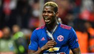 Manchester United's French midfielder Paul Pogba celebrates with his medal after the UEFA Europa League final football match Ajax Amsterdam v Manchester United on May 24, 2017 at the Friends Arena in Solna outside Stockholm. AFP / Jonathan NACKSTRAND
