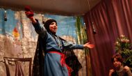 Syrian girls act in an English-language school-play adaptation of Snow White and the Seven Dwarfs at a local school in the rebel-held town of Douma, on the eastern outskirts of Damascus, on May 23, 2017. AFP / Abdullah HAMMAM
