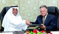 ABHAIF Chairman H E Abdullah bin Hamad Al Attiyah and Dr John Duke Antony, Founding President and CEO of the National Council on US Arab Relations, at the ceremony. Pic:  Salim Matramkot / The Peninsula
