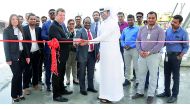 Abdullah Mohammed Al Kuwari, Acting CEO; Sure V. Satyanarayana and  Manateq Senior Project Manager Damien Healey jointly inaugurating the new ready mix plant in the Manateq Economic Zone. 