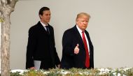 FILE PHOTO: US President Donald Trump gives a thumbs-up as he and White House Senior Advisor Jared Kushner depart the White House in Washington, US, March 15, 2017. REUTERS/Kevin Lamarque/File Photo