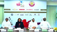 Manar Khalifa Al Muraikhi, Director of Community and Public Relations of Ooredoo Qatar, with senior officials from other sponsor organisations.