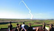 FILE PHOTO: North Korean leader Kim Jong Un watches the test of a new-type anti-aircraft guided weapon system organised by the Academy of National Defence Science in this undated photo released by North Korea's Korean Central News Agency (KCNA) May 28, 20