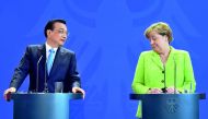 German Chancellor Angela Merkel (right) and Chinese Prime Minister Li Keqiang give a joint press conference after representatives of both countries signed economic agreements at the end of Li's two-day visit to Germany. Chancellor Merkel also addressed th