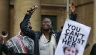 Leading vocalist of 'Captain SKA', Abiola performs the track 'Liar, Liar' during a protest to complain about BBC Radio 1's refusal to play the 'Liar Liar' song, outside BBC Broadcasting House in London on June 2, 2017. AFP / Daniel LEAL-OLIVAS