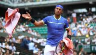 Spain's Rafael Nadal gives a towel back as he plays against Georgia's Nikoloz Basilashvili during their tennis match at the Roland Garros 2017 French Open on June 2, 2017 in Paris. (AFP / Lionel Bonaventure)