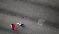 An opposition supporter rally against Venezuela's President Nicolas Maduro in Caracas, Venezuela, June 2, 2017. Reuters/Christian Veron