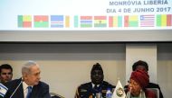 Israel's Prime Minister Benjamin Netanyahu (2-L) looks on as Liberia's President and ECOWAS (Economic Community of West African States) Chairperson Ellen Johnson Sirleaf (R) speaks during the ECOWAS summit on June 4, 2017 in Monrovia. AFP / Zoom DOSSO