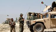 Afghan National Army (ANA) keep watch at a check post in Chaparhar district of Nangarhar province, Afghanistan May 24, 2017. Picture taken on May 24, 2017. REUTERS/Parwiz.