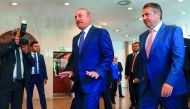German Foreign Minister Sigmar Gabriel (right) walks with his Turkish counterpart Mevlut Cavusoglu in Ankara, yesterday, before a meeting over the thorny issue of access to the Incirlik military air base near Syria.