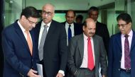 RBI governor Urjit Patel (left) arrives ahead of a press conference at the RBI headquarters in Mumbai, yesterday.