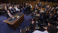 Former FBI Director James Comey (L) testifies during a US Senate Select Committee on Intelligence hearing on Capitol Hill in Washington, United States on June 08, 2017. (Samuel Corum - Anadolu Agency)