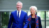 French Economy Minister Bruno Le Maire (left) greets Christine Lagarde, head of the International Monetary Fund (IMF), upon her arrival at the Bercy Finance Ministry in Paris, France, yesterday.