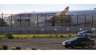 A China Eastern Airbus A330 passenger aircraft, which suffered a serious fault to its starboard engine following take-off, sits on the tarmac at Sydney Airport on June 12, 2017. The plane suffered a serious fault that tore a huge hole in one of its engine