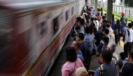 File picture of commuters waiting for the train in Jakarta, Indonesia. REUTERS/Beawiharta
