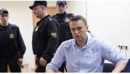 Alexei Navalny (right) intends to stand for the Russian presidency next year. / AFP.