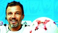 New Zealand's head coach Anthony Hudson talks to media during a press conference in Saint Petersburg.