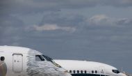 A Boeing 737 MAX and an Embraer E190-E2 are seen on the static display, before the opening of the 52nd Paris Air Show at Le Bourget airport near Paris, France, June 16, 2017. REUTERS/Pascal Rossignol

