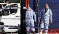Forensic officers work at the scene in Finsbury Park area of north London after a vehichle hit pedestrians, on June 19, 2017.   AFP / Tolga AKMEN
