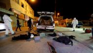 Crime scene personnel are seen gathering evidence where a blast took place in the village of Diraz, Bahrain, June 19, 2017. REUTERS/Hamad I Mohammed
