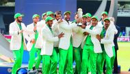 Captain Sarfraz Ahmed (third right) lifts the trophy as Pakistan team celebrate their win over India after the ICC Champions Trophy final at the Oval in London, on Sunday. 