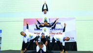 Participants demonstrating different yoga postures.
