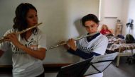 Volunteer members of Musica Para el Alma (Music for the Soul) perform for patients at the Alvarez Hospital in Buenos Aires on June 12, 2017. AFP / EITAN ABRAMOVICH 