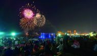 People enjoying fire works as part of the Eid Al Fitr celebrations in Katara, yesterday. Pic: Baher Amin / The Peninsula 