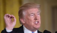 US President Donald Trump speaks during a signing ceremony for the Department of Veterans Affairs Accountability and Whistleblower Protection Act of 2017, on June 23, 2017, in the East Room of the White House in Washington, DC. (AFP / Mandel Ngan)