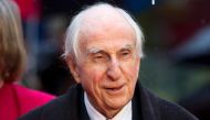 Michael Bond, the creator of Paddington the bear, posing for pictures on the red carpet upon arrival for the world premiere of 