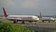 Air India planes preparing for take-off at Indira Gandhi International Airport in New Delhi. (AFP / MANAN VATSYAYANA)