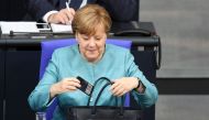 German Chancellor Angela Merkel arrives to make her speech regarding last week's EU Summit and the upcoming G-20 Summit at the German parliament Bundestag in Berlin, Germany on June 29, 2017. (Maurizio Gambarini - Anadolu Agency)
