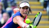 Britain's Johanna Konta plays a shot against Latvia's Jelena Ostapenko during their women's singles third round tennis match at the ATP Aegon International in Eastbourne.