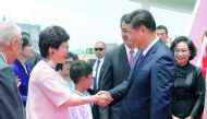 Chinese President Xi Jinping is welcomed by Chief Executive-elect Carrie Lam upon Xi's arrival in Hong Kong, yesterday.

