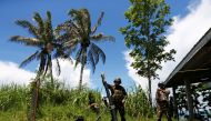 Filipino soldiers launch a mortar from their combat position as government troops continue their assault against insurgents from the Maute group in Marawi city, Philippines July 1, 2017. (REUTERS/Jorge Silva)