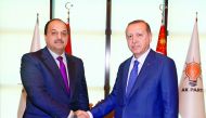 Minister of State for Defence, H E Dr Khalid bin Mohammed Al Attiyah, with Turkish President Recep Tayyip Erdogan in Ankara, yesterday.