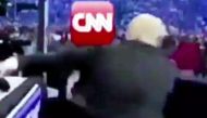 After Trump appears to beat on the CNN effigy, a logo, “FNN Fraud News Network” appears at the bottom of the screen in script similar to that of CNN.