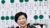 Tokyo Governor and head of Tokyo Citizens First party Yuriko Koike smiles as she defeated Prime Minister Shinzo Abe's ruling party in metropolitan elections in the capital on July 2, 2017. Photo: Kyodo/via Reuters.