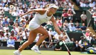 Germany's Angelique Kerber returns against US player Irina Falconi during their women's singles first round match on the first day of the 2017 Wimbledon Championships at The All England Lawn Tennis Club in Wimbledon, southwest London, on July 3, 2017. (AF