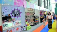 Stalls at the Entertainment City at the Doha Exhibition and Convention Center as part of Qatar Summer Festival, yesterday. Pic: Kammutty V P / The Peninsula