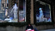 File photo taken on November 24, 2015 shows a homeless woman in front of a store on Fifth Avenue in New York (AFP / JEWEL SAMAD)