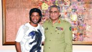 Brazilian football legend  Ronaldinho (left) poses for photograph with Pakistani Army Chief General Qamar Javed Bajwa during his visit to Pakistan to play in two exhibition games, in Rawalpindi. 