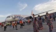 Air hostesses walk next to the parked Air India Boeing 787-800 Dreamliner upon its arrival at the airport in New Delhi, September 8, 2012 (REUTERS / Mansi Thapliyal) 