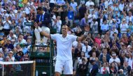 Gilles Muller of Luxembourg celebrates after beating Rafael Nadal of Spain on day seven of the 2017 Wimbledon Championships at the All England Lawn and Croquet Club in London, United Kingdom on July 10 2017. (Lindsey Parnaby - Anadolu Agency)