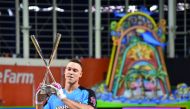 American League outfielder Aaron Judge (99) of the New York Yankees celebrates with the trophy after winning the 2017 MLB Home Run Derby at Marlins Park in Miami on Monday.