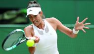 Spain's Garbine Muguruza returns against Slovakia Magdalena Rybarikova during their women's singles semi-final match of the 2017 Wimbledon Championships at The All England Lawn Tennis Club in Wimbledon, southwest London. 