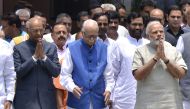  This file photo taken on June 23, 2017 shows Ram Nath Kovind (L), the National Democratic Alliance (NDA) governments's candidate for the upcoming presidential election, gesturing as he leaves an NDA meeting with Indian Prime Minister Narendra Modi (R) an