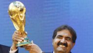 HH Sheikh Hamad bin Khalifa Al-Thani, then Emir of Qatar, holds the World Cup trophy after the announcement of Qatar hosting the 2022 soccer World Cup in Zurich, Switzerland, Thursday, Dec. 2, 2010.