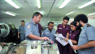 Students in a laboratory at Qatar Aeronautical College, yesterday.  Pic: Baher Amin/ The Peninsula